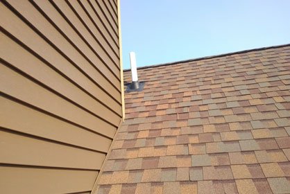 Siding on side of new home.
