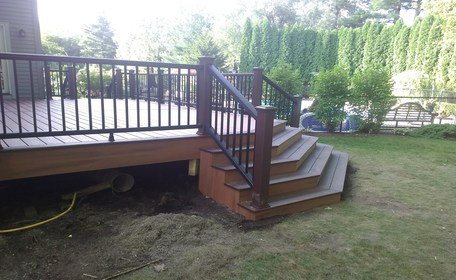 Patio and garden of family home at summer.